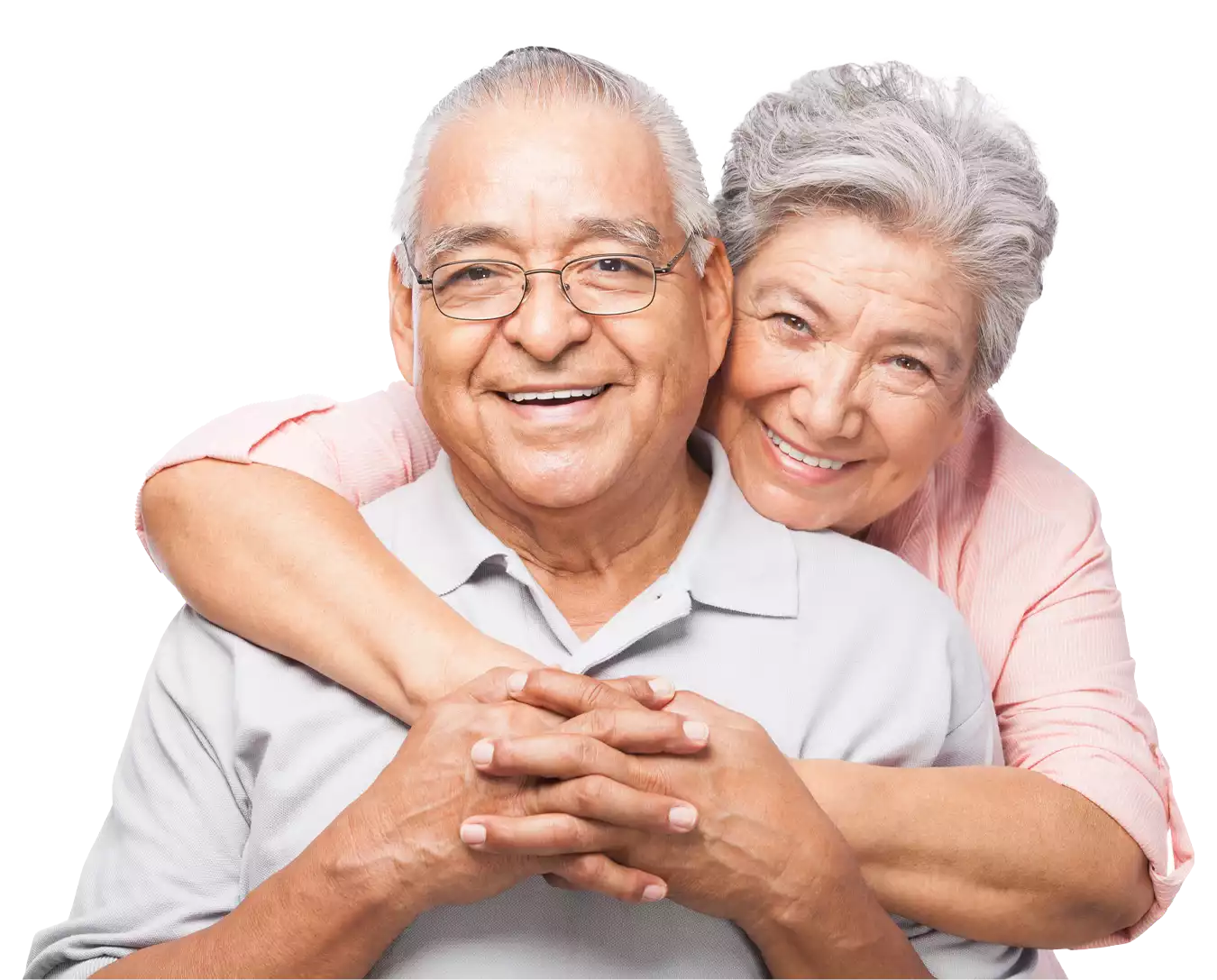 Smiling older couple holding each other